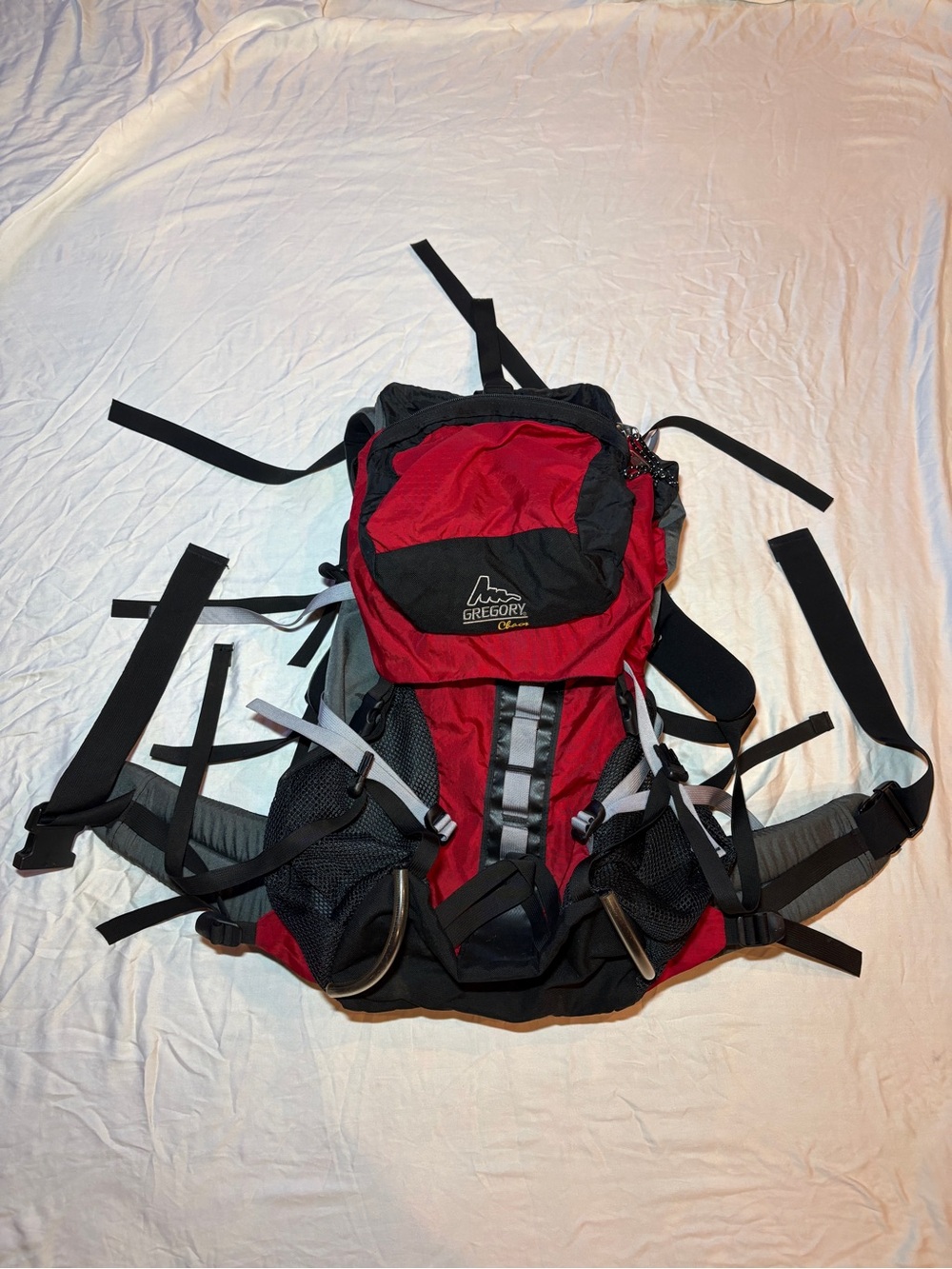Gregory red and black technical hiking pack
